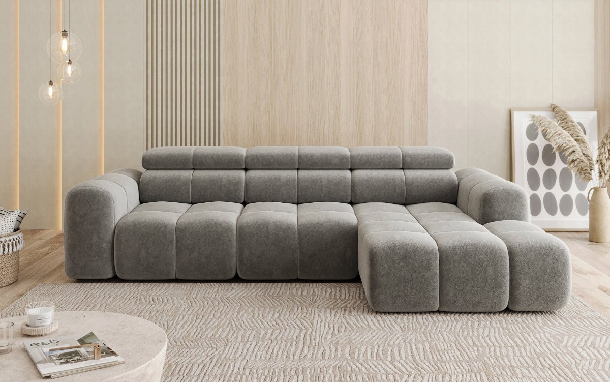 Designer Sofa Mia L mat elektrescher Sëtzvergréisserung a Chenille