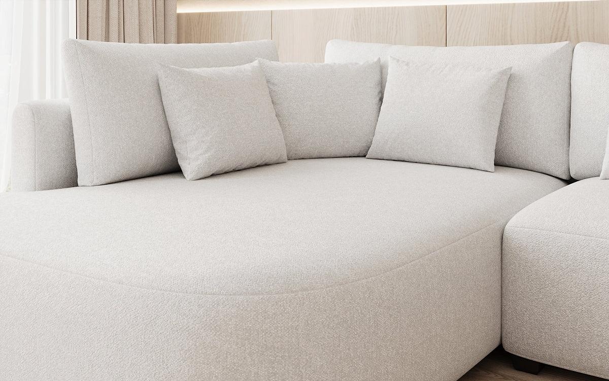 Designer-Ecksofa Ando mat breeder Ottomane aus Strukturstoff