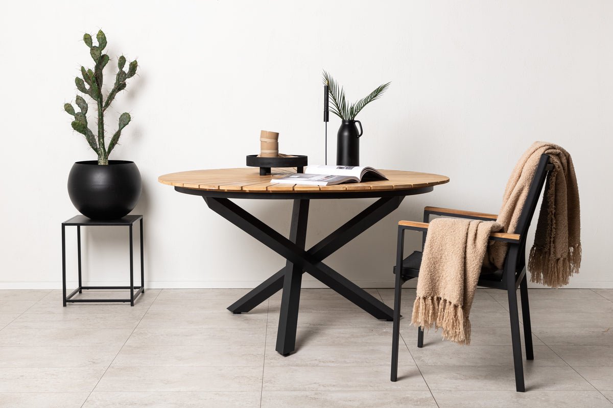 Gartentisch Mirani - en ronne Iessdësch aus Metall a Teakholz