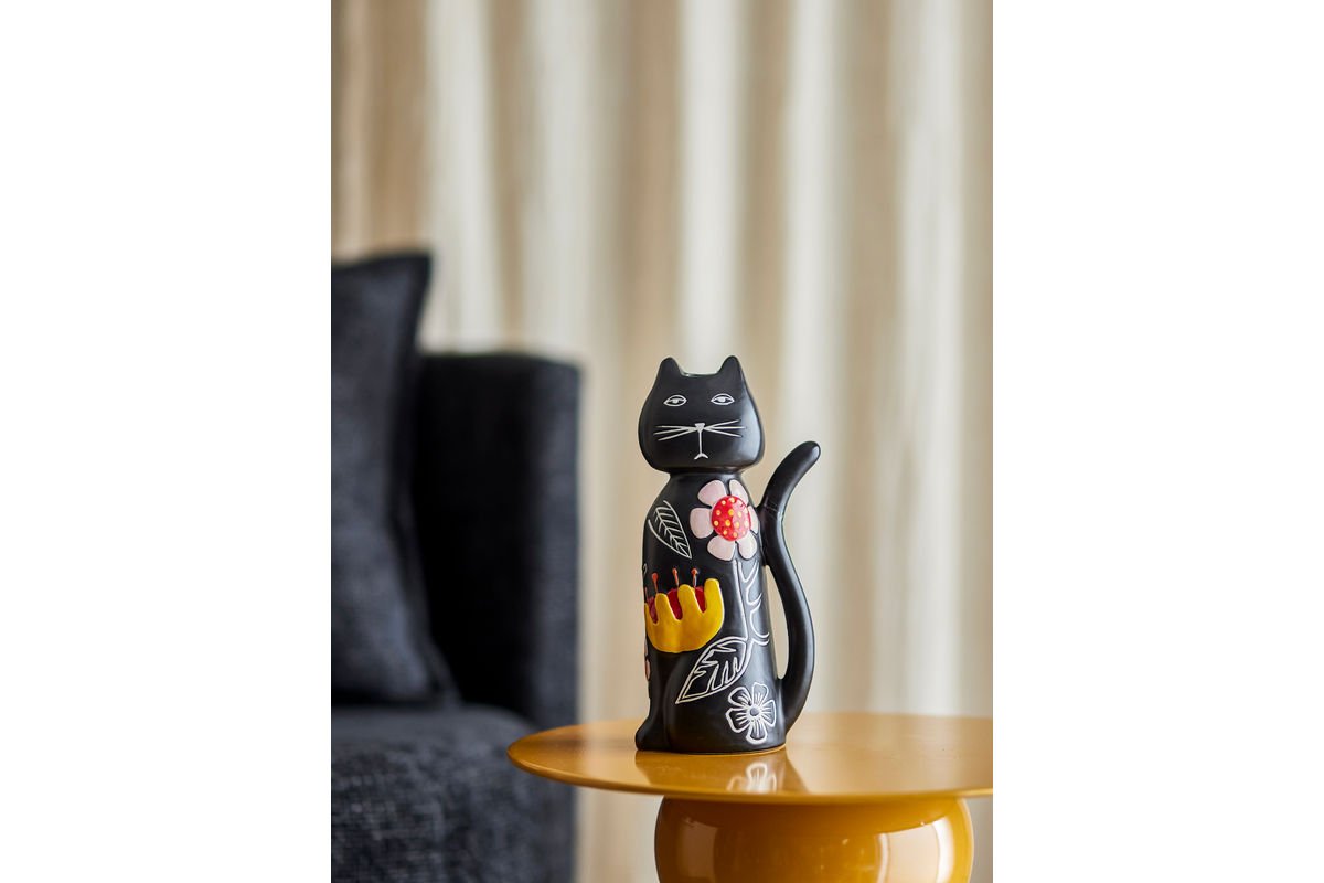 Kerzenhalter Nera – Handbemoolt Kazefigur mat florale Akzenter