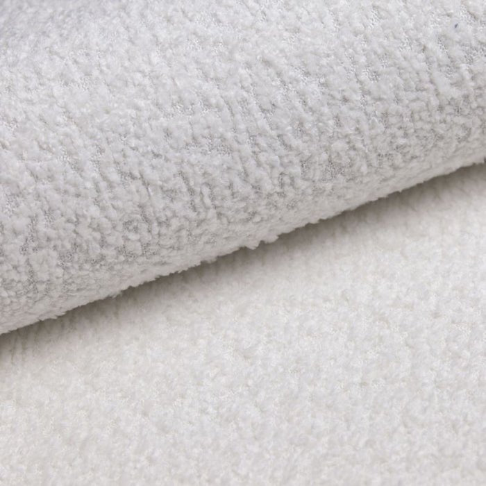 Modulärt Ecksofa Yuma L aus Bouclé