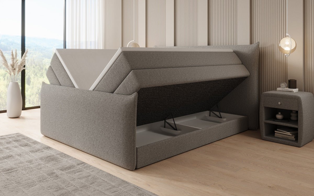 Boxspringbett Liana II mat héichklappbarem Stauraum an Teddy Bouclé