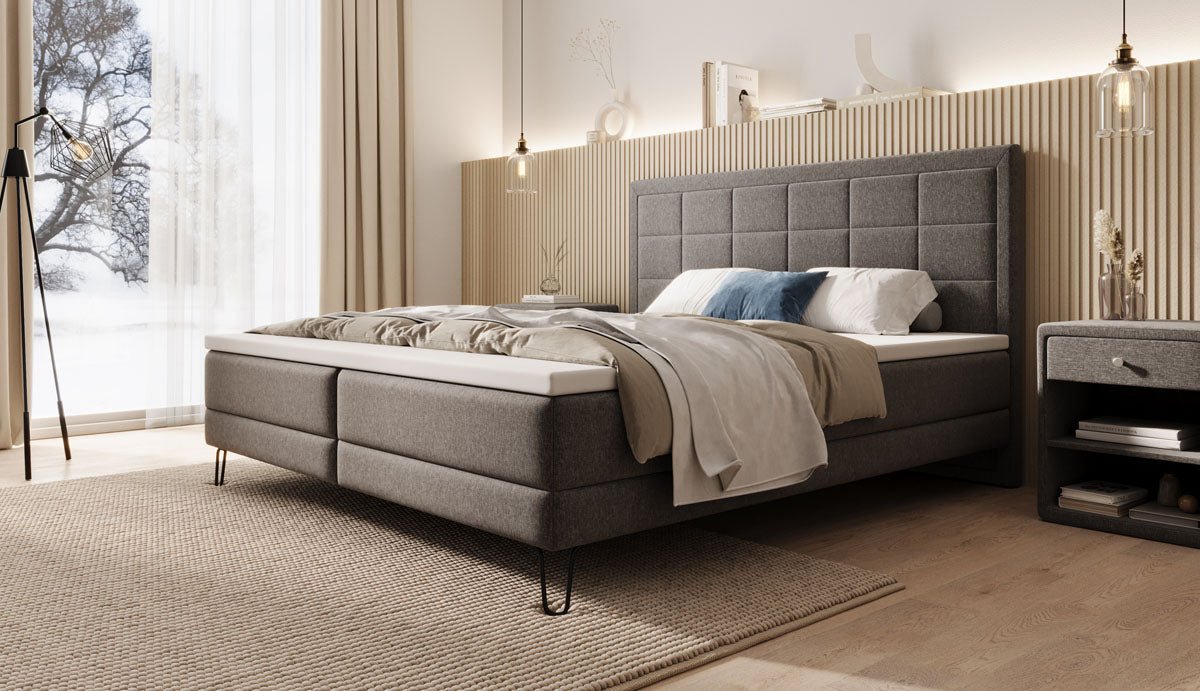 Boxspringbett Mariella mat Féiss a Stoff