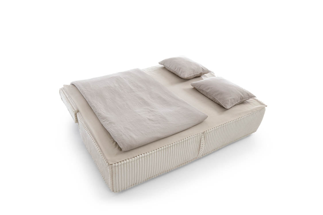 Designer Sofa Komma mat Schloffunktion an Stauraum