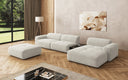 Designer-Ecksofa Calm mat Bäihocker a Bäidësch a Bouclé
