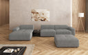 Designer-Ecksofa Calm mat Bäihocker a Bäidësch a Bouclé