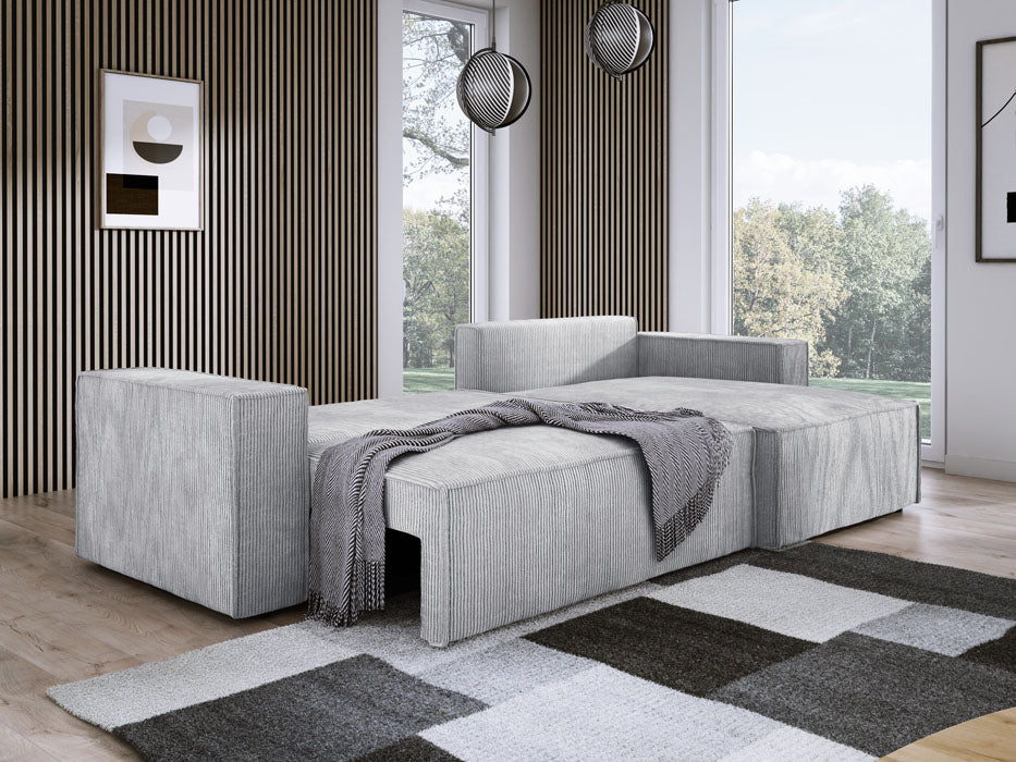 Designer Sofa Velanova mit Schlaffunktion und Stauraum aus Cord