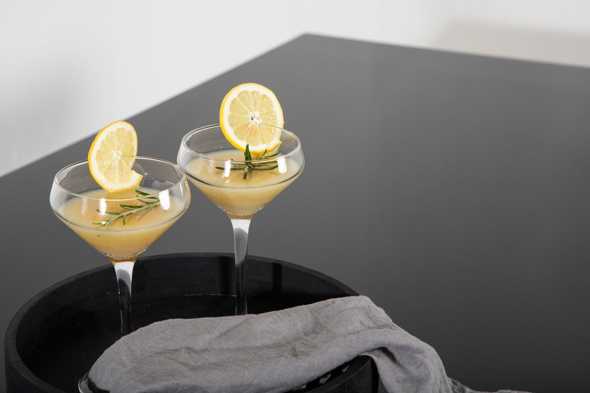 Garden table Kaoni - a combination of black steel and dark glass top