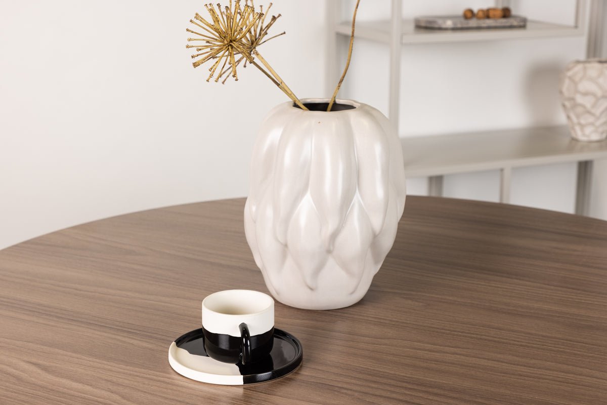 Esstisch Marani - runde Formen treffen auf zeitlose Eleganz