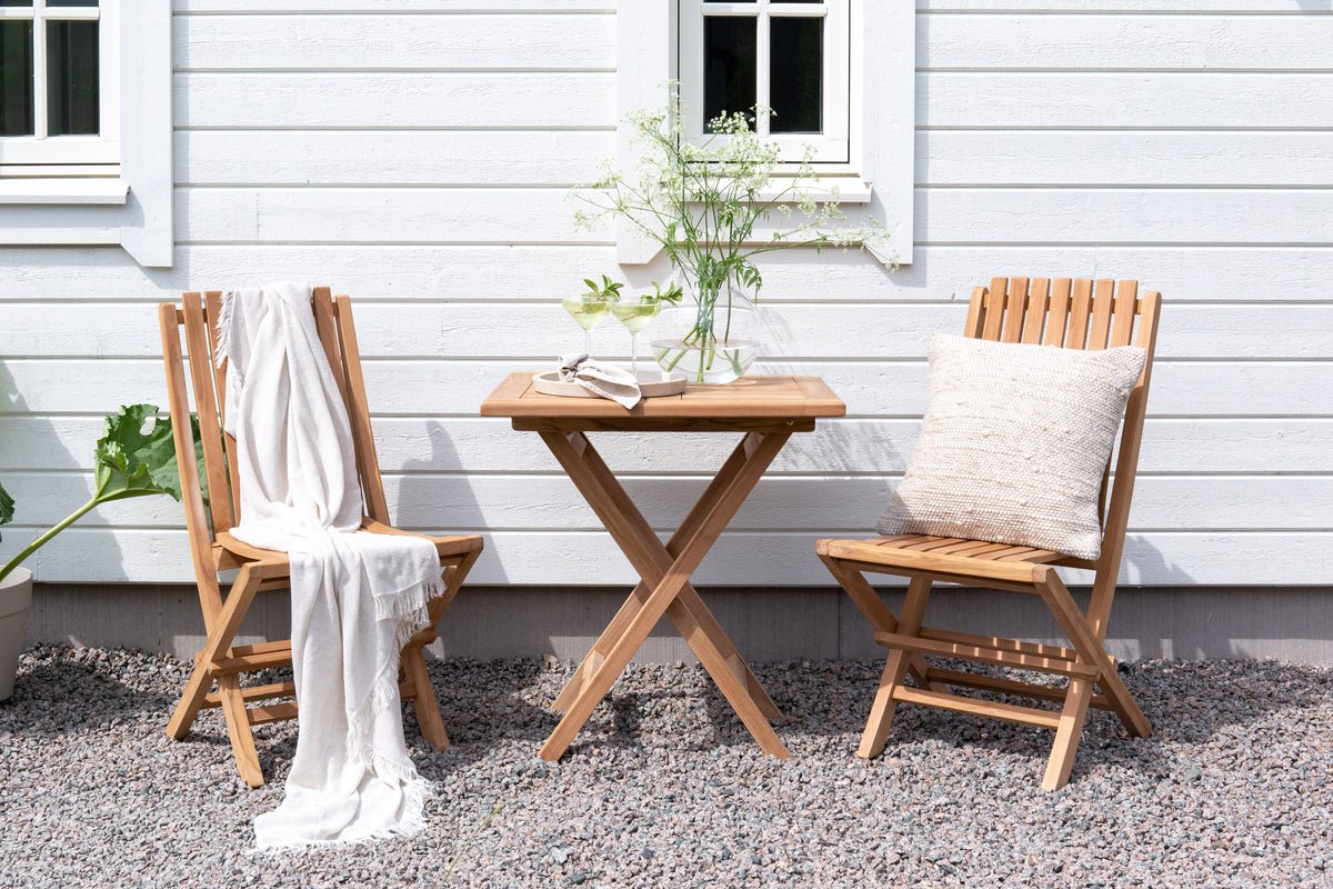 Garden table Siana - a square dining table made of teak wood