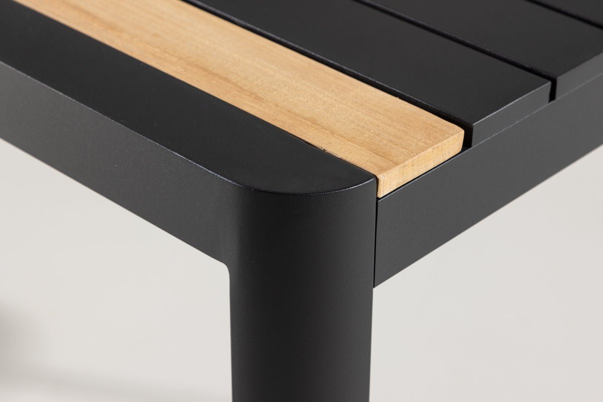 Table de jardin Nuru - Teck et aluminium pour stabilité et durabilité