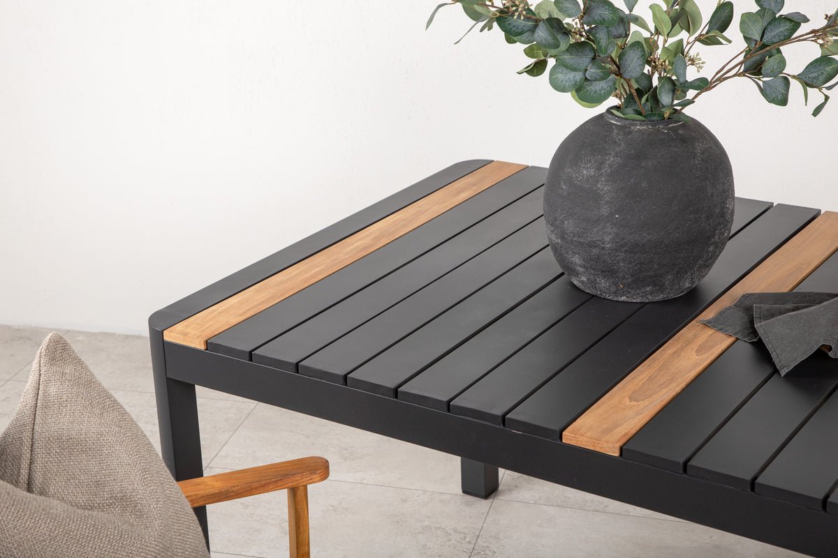 Table de jardin Nuru - Teck et aluminium pour stabilité et durabilité