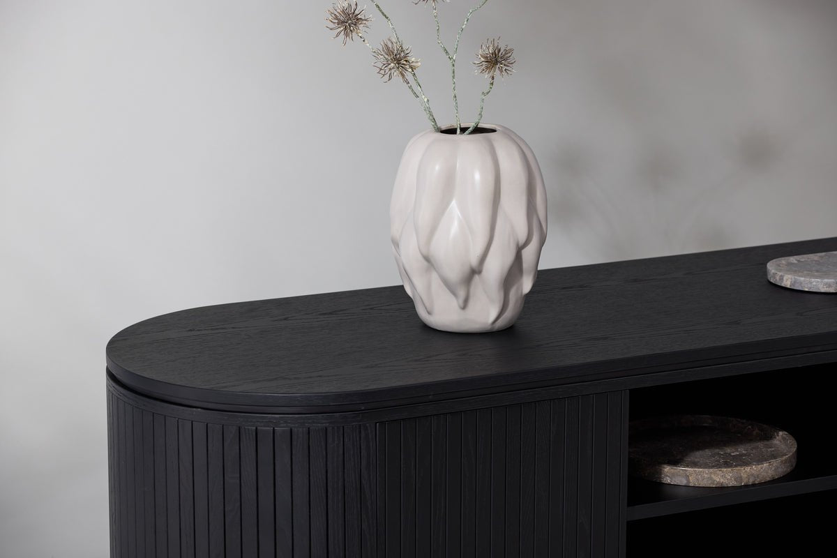 Designer TV lowboard Sundby – Black in oak look with slatted front