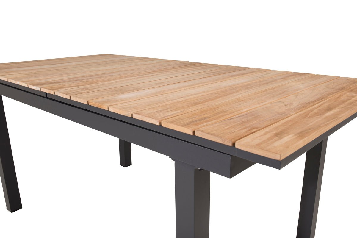Garden table Caimana - an extendable dining table with a noble teak wood top