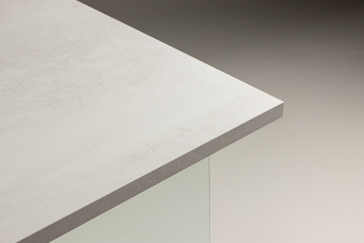 Brevon dining table - modern dining table on a glass frame with light gray tabletop