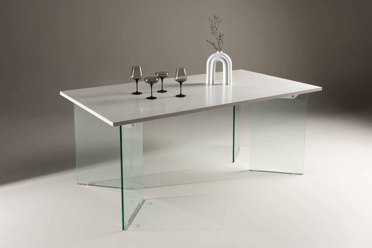 Brevon dining table - modern dining table on a glass frame with light gray tabletop