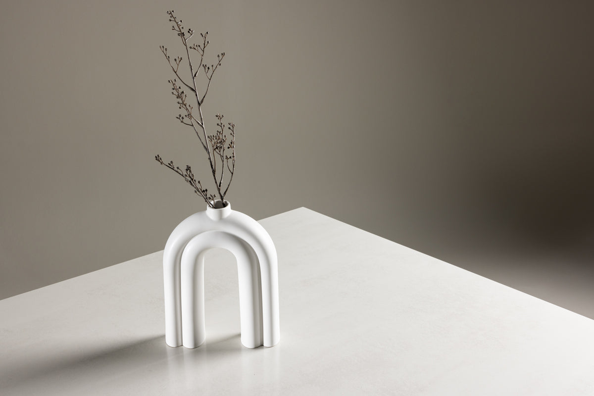 Brevon dining table - modern dining table on a glass frame with light gray tabletop