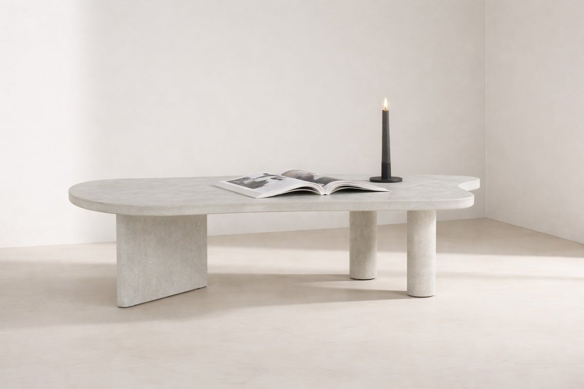 Table basse Adam - en aspect béton gris clair avec design asymétrique