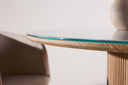 Dining table Orlén – Round design dining table Ø120 cm with glass top and ribbed base