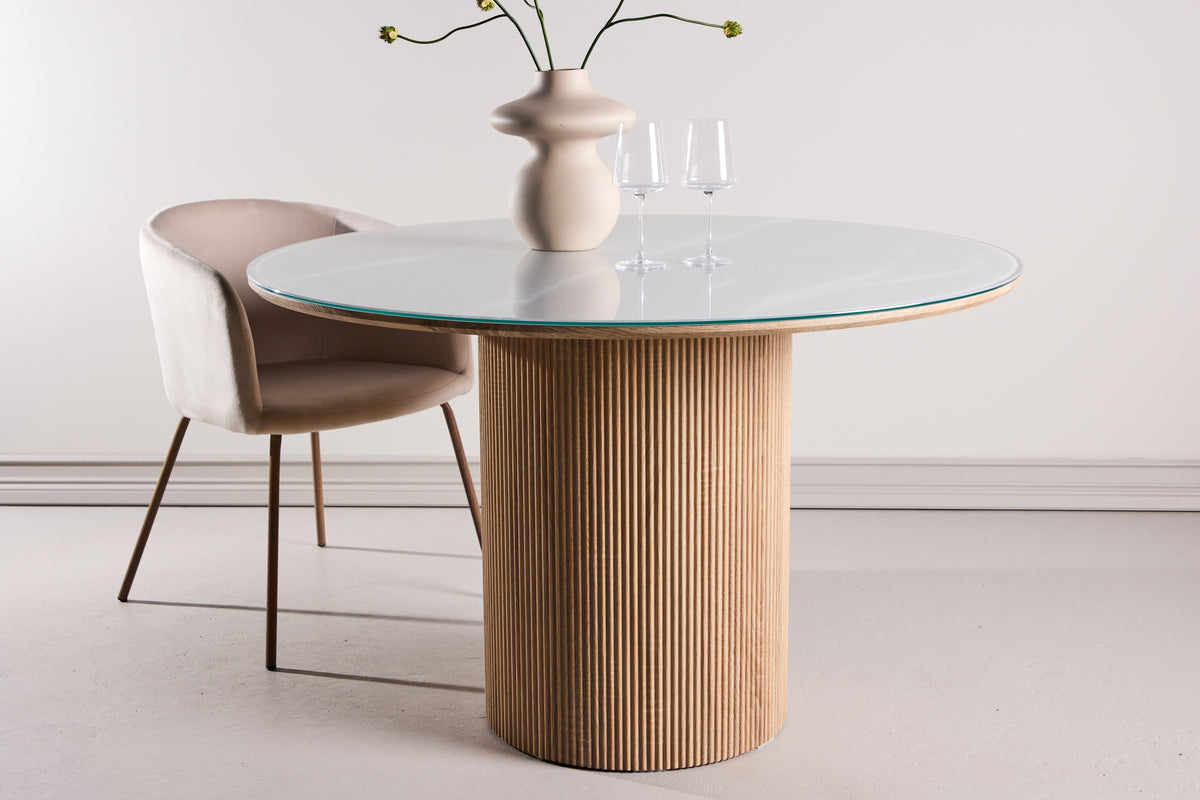Dining table Orlén – Round design dining table Ø120 cm with glass top and ribbed base