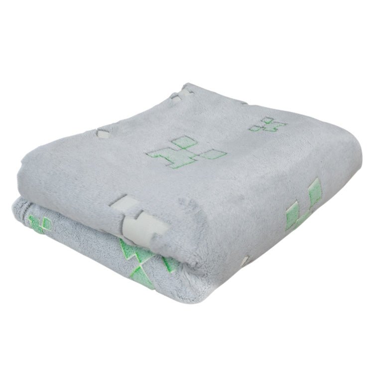 Minecraft Kuscheldecke „Glow“ – mat Glow-in-the-Dark Effekt & mëllen Fleece