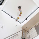 Pendant light Elaris – 7 staggered lights in the metal color combination Gold,Copper and Chrome