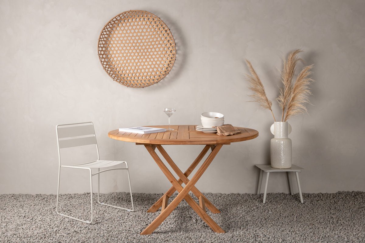 Garden table Oraya - a round dining table made of teak wood