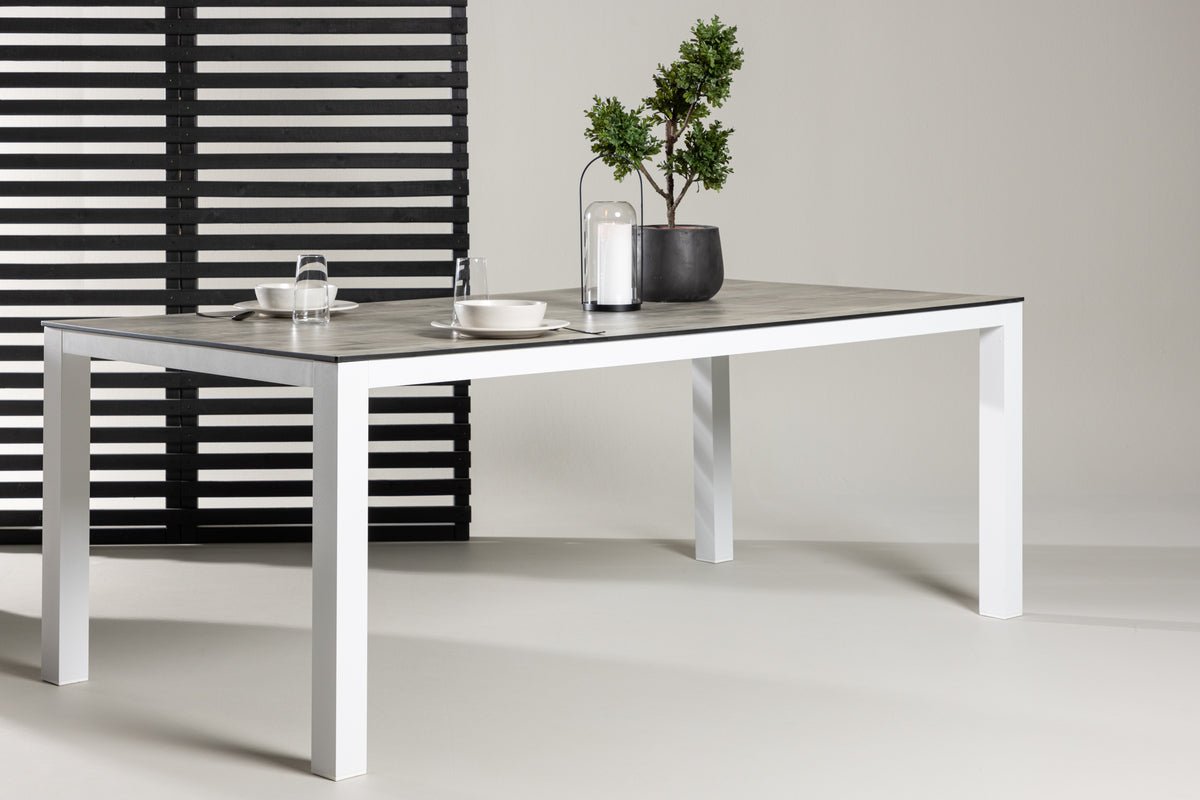Garden table Kisiwa - a white gray rectangular dining table