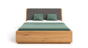 Designer Holzbett Cassian aus massiver Eech mat Stauraum