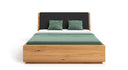 Designer Holzbett Cassian aus massiver Eech mat Stauraum