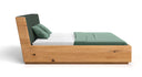 Designer Holzbett Cassian aus massiver Eech mat Stauraum