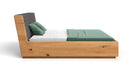 Designer Holzbett Cassian aus massiver Eech mat Stauraum