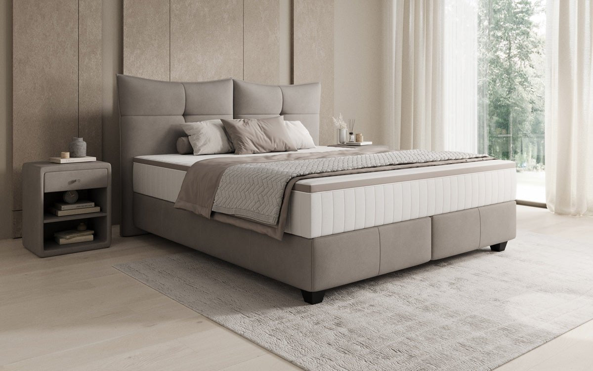 Lit boxspring Veyora en cuir véritable