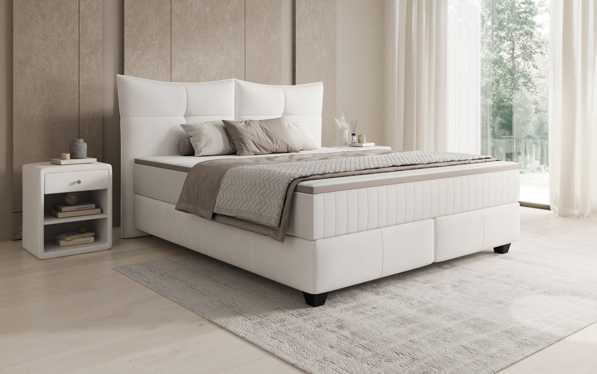 Lit boxspring Veyora en cuir véritable