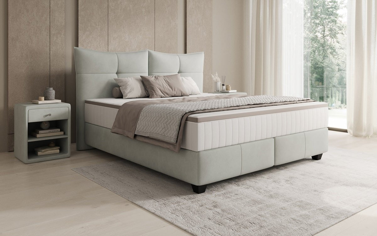 Lit boxspring Veyora en cuir véritable