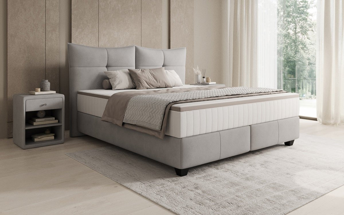 Lit boxspring Veyora en cuir véritable