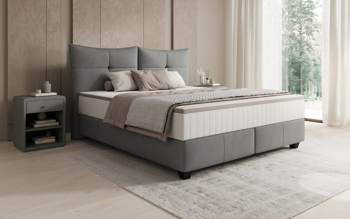Lit boxspring Veyora en cuir véritable