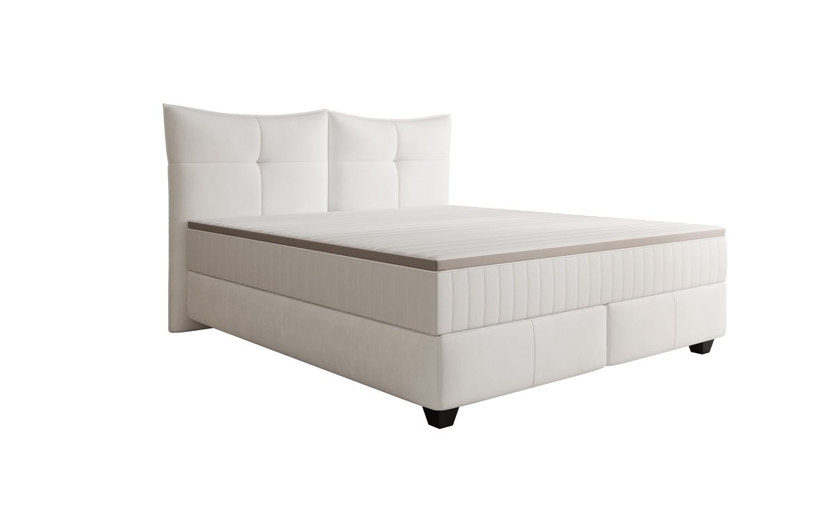 Lit boxspring Veyora en cuir véritable