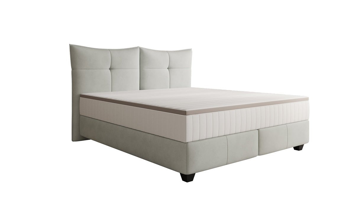 Lit boxspring Veyora en cuir véritable