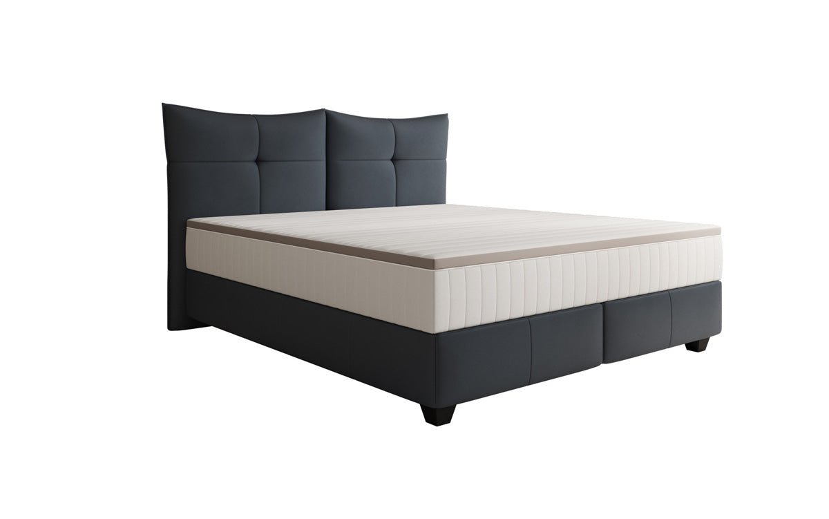 Lit boxspring Veyora en cuir véritable