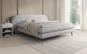 Lit boxspring Marisol avec tête de lit ovale en Bouclé