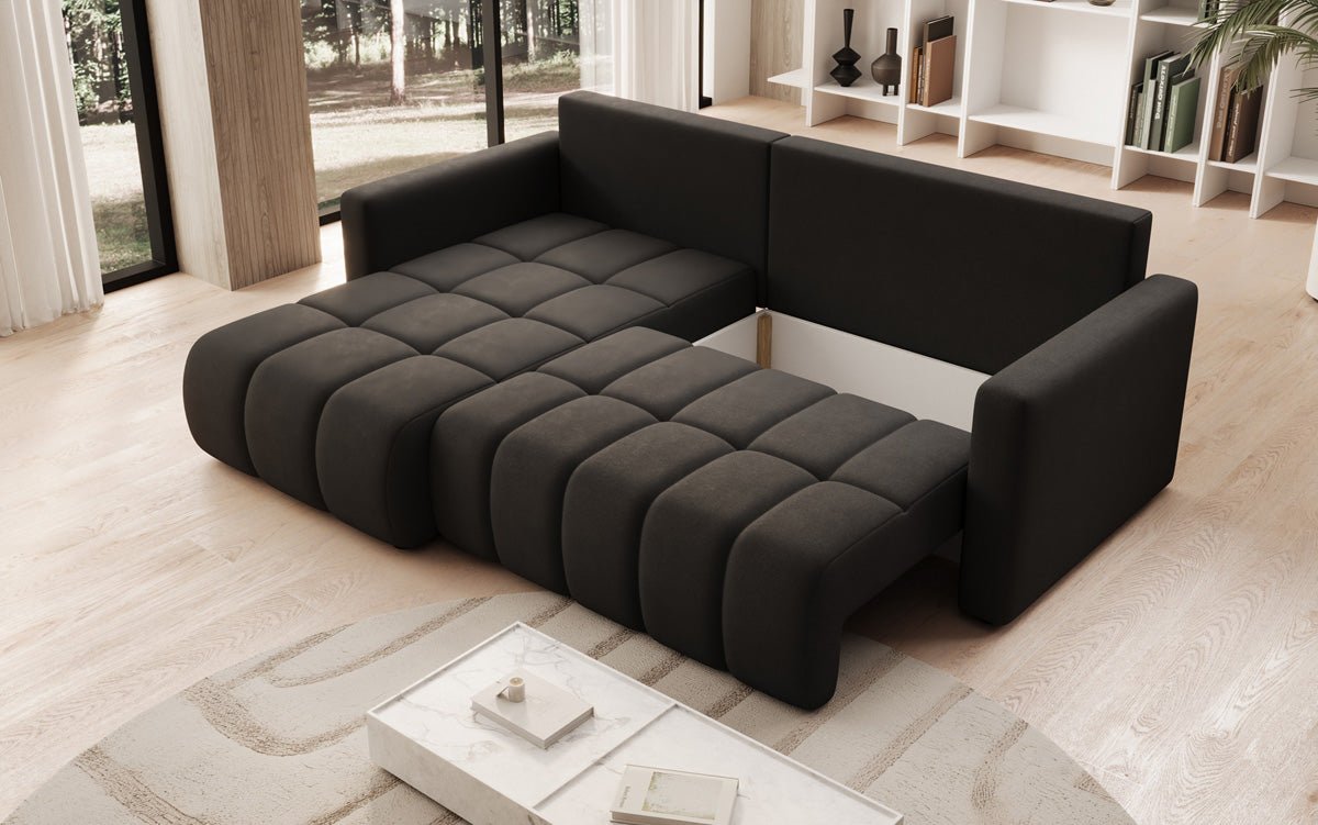 Designer sofa Beatrice L with sleeping and folding function in fabric