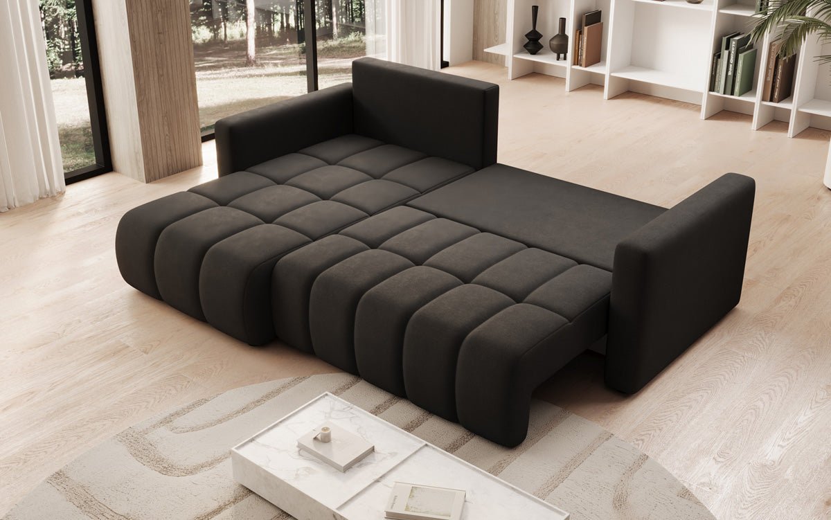 Designer sofa Beatrice L with sleeping and folding function in fabric