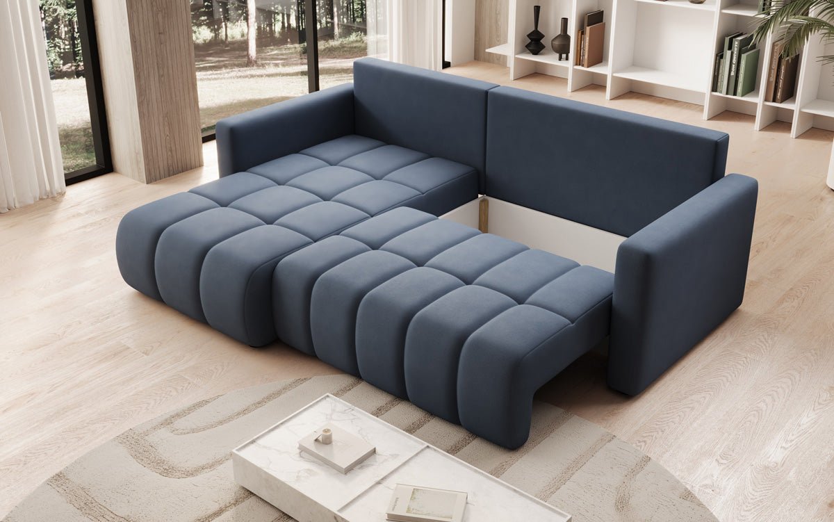 Designer sofa Beatrice L with sleeping and folding function in fabric