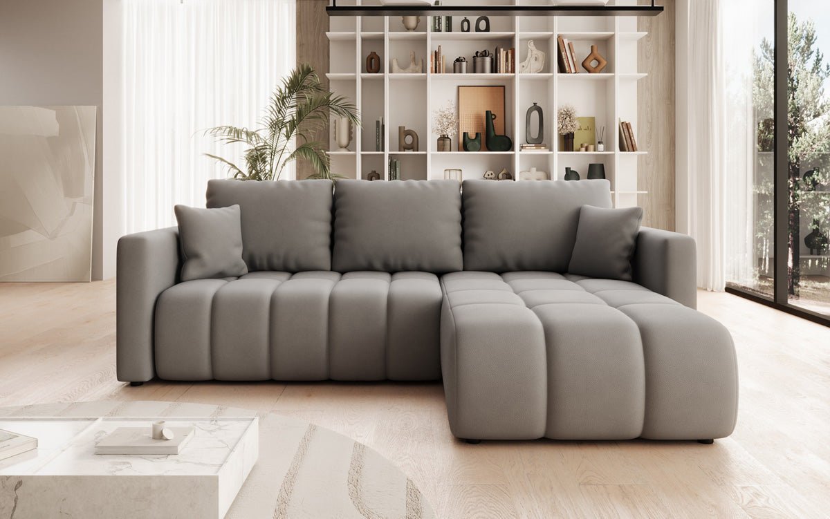Designer sofa Beatrice L with sleeping and folding function in fabric