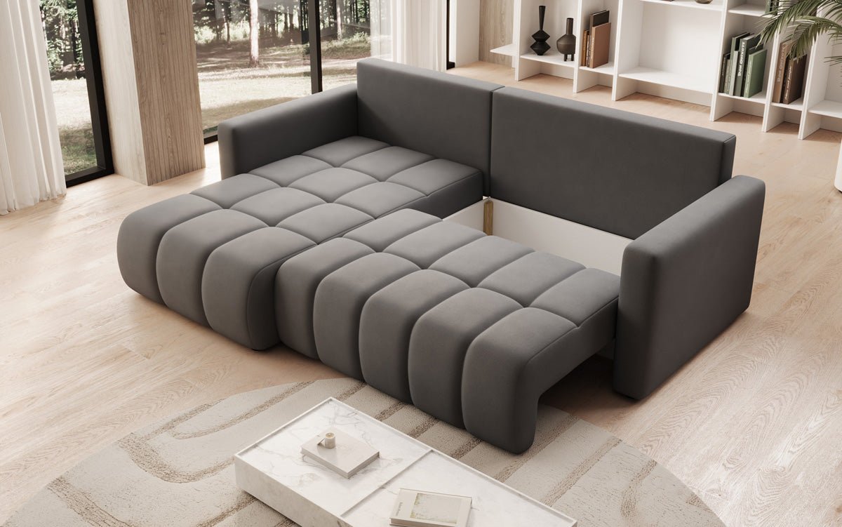 Designer sofa Beatrice L with sleeping and folding function in fabric