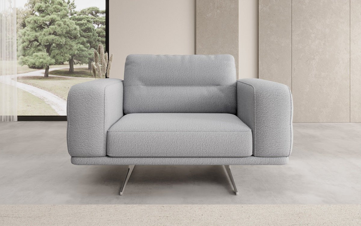 Fauteuil design Torino avec accoudoirs en Bouclé
