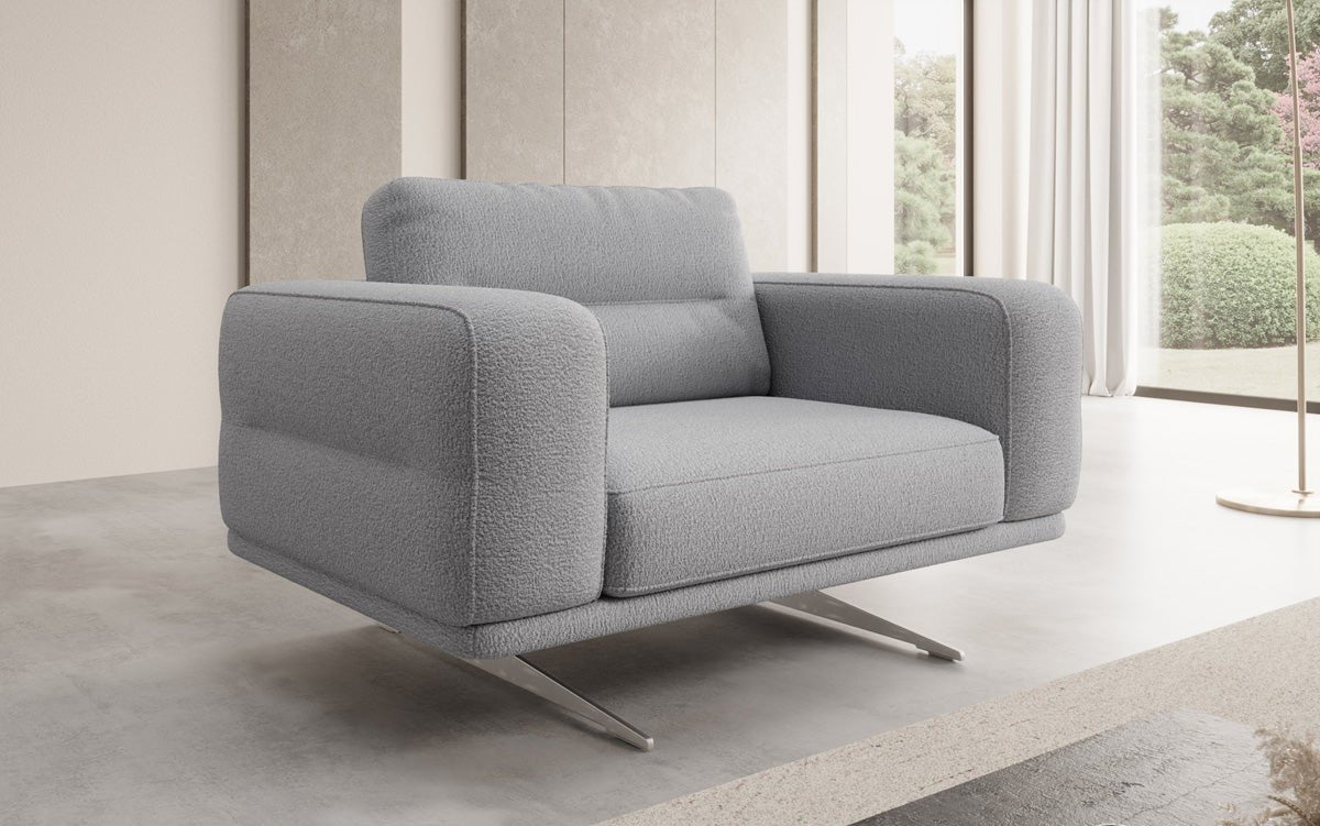 Fauteuil design Torino avec accoudoirs en Bouclé