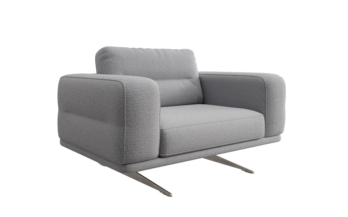 Fauteuil design Torino avec accoudoirs en Bouclé