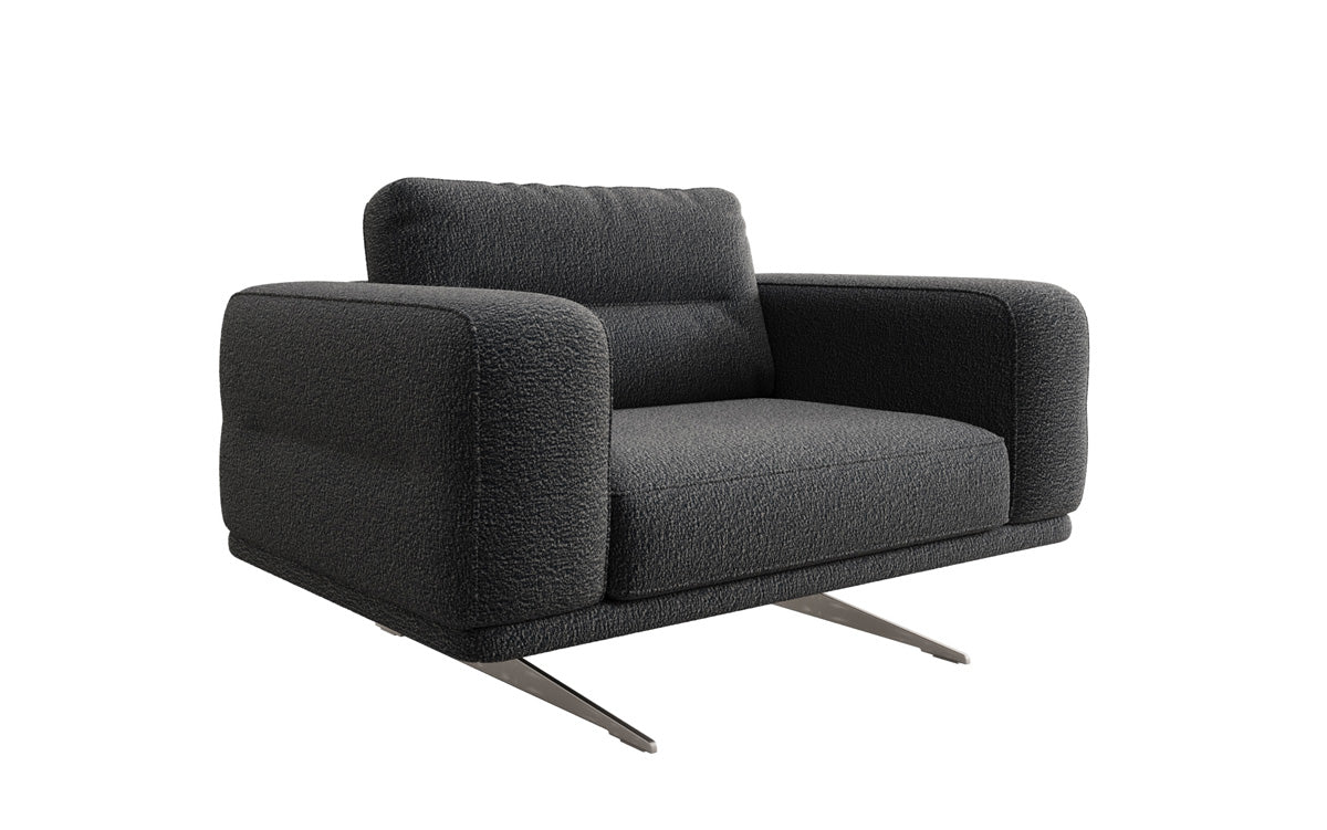 Fauteuil design Torino avec accoudoirs en Bouclé